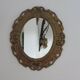 Golden baroque oval mirror, 60s-70s