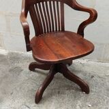 Old American office chair rounded around 1940 in oak