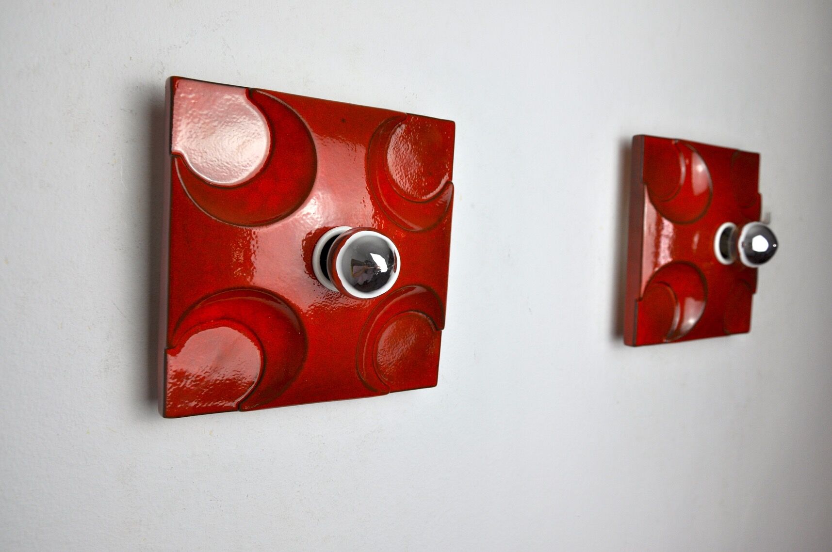 Pair of Fat Lava wall lamps by Hustadt Leuchten, Orange ceramic, Germany, 1960