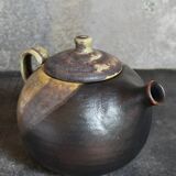 Vintage enameled stoneware potter's teapot