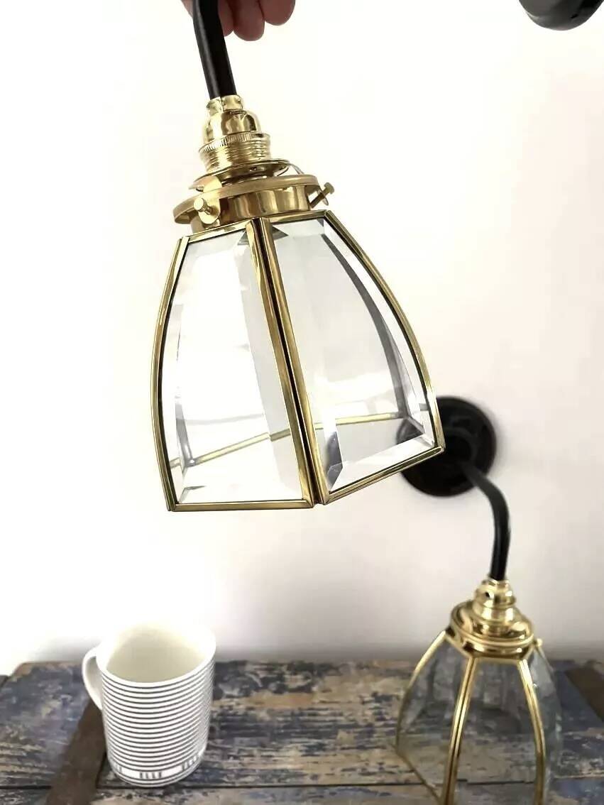 Pair of brass and glass wall lights