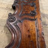 Cornice pediment in low relief in wood