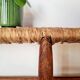 Old wooden and straw bench