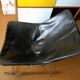 Fauteuil cuir G1, bascule. Pierre Guariche édition Maison du Monde