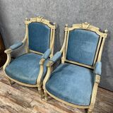 Pair of Louis XVI style armchairs in molded, carved wood