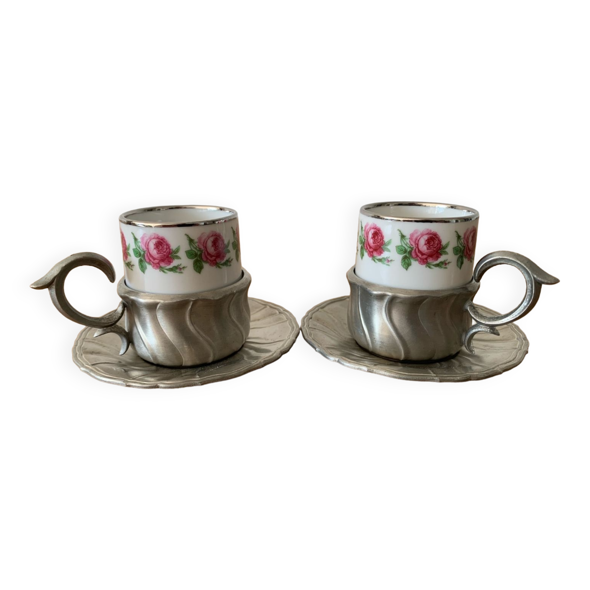 2 small porcelain cups and their pewter cup holders