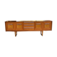 Atypical teak row of the 60s