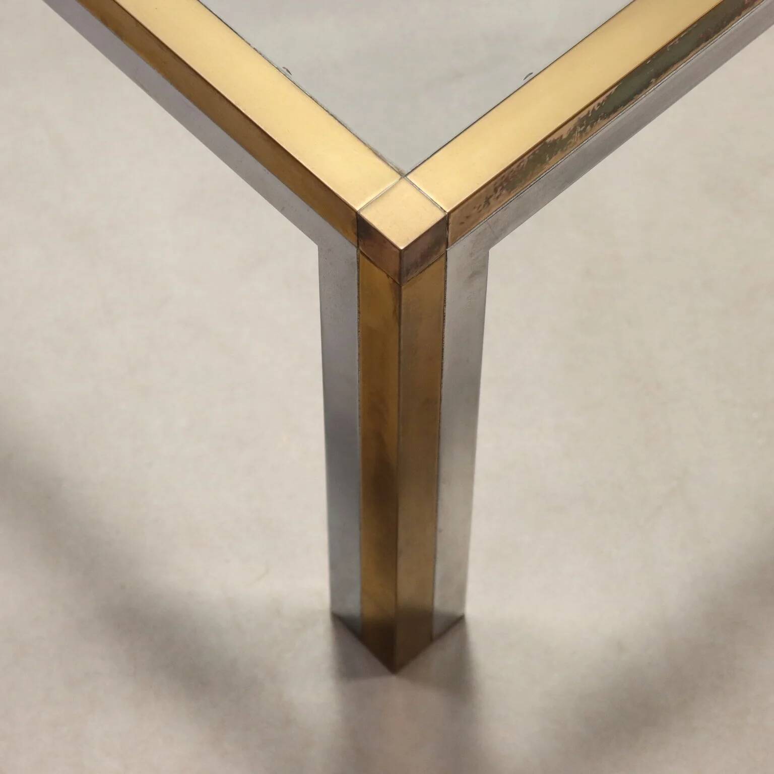 Vintage coffee table in metal, brass and glass, 1970s design.