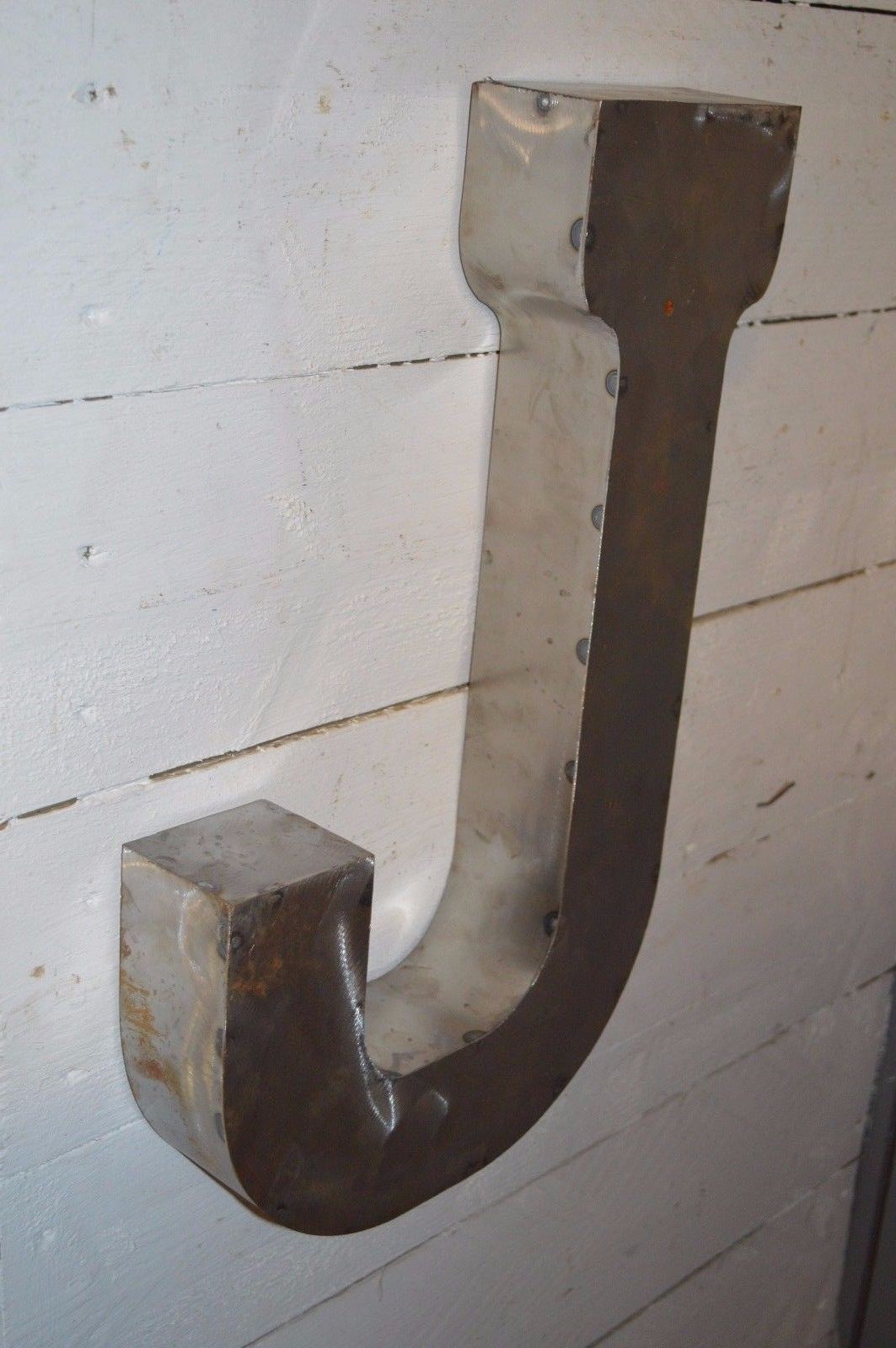 Industrial iron "j" letter