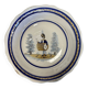 Large earthenware centerpiece dish with painted decoration of a drummer
