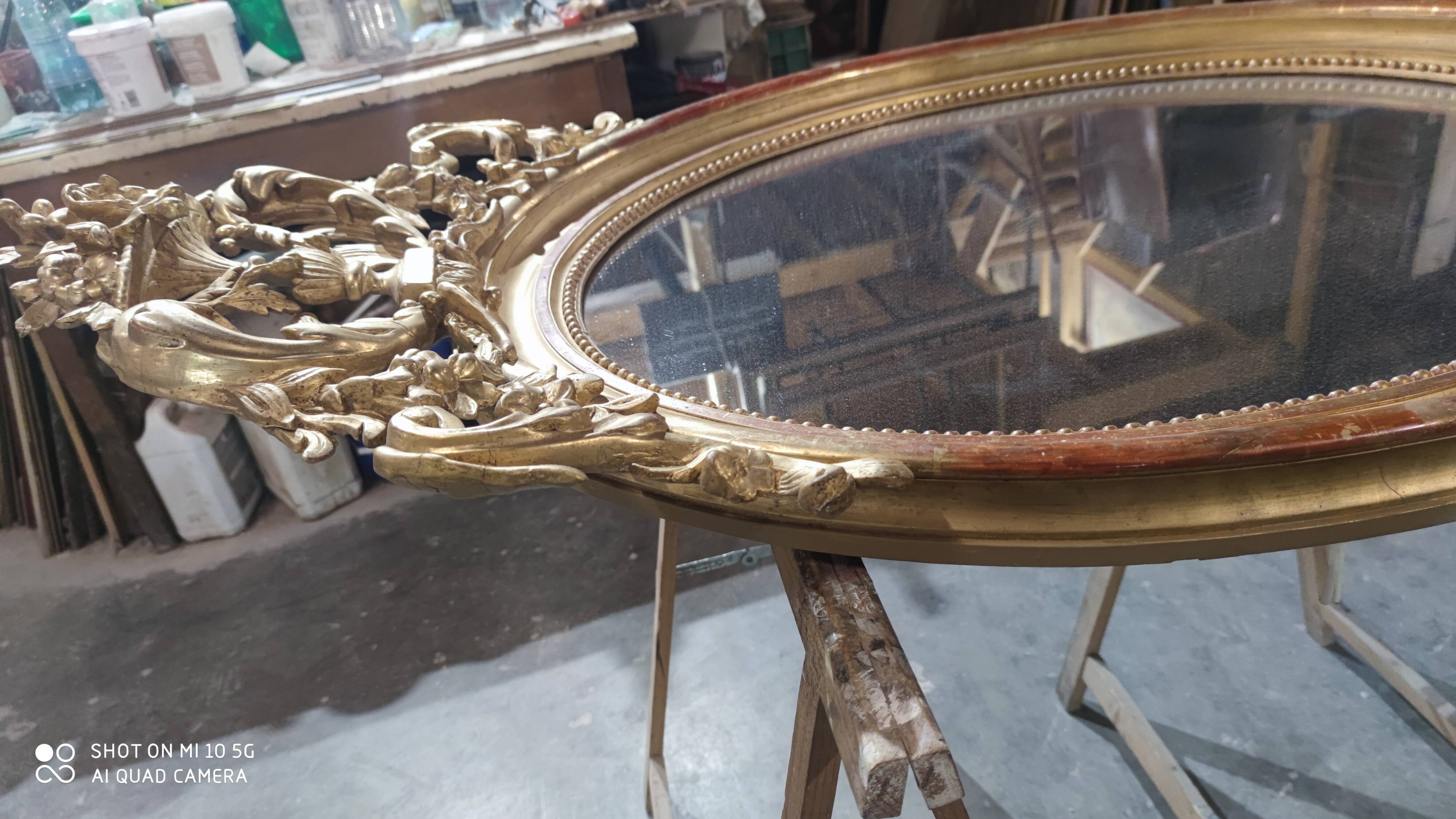 Mirror with a gilt medallion pediment, 1840