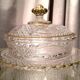Butter dish or candy dish in pressed glass molded with golden rim