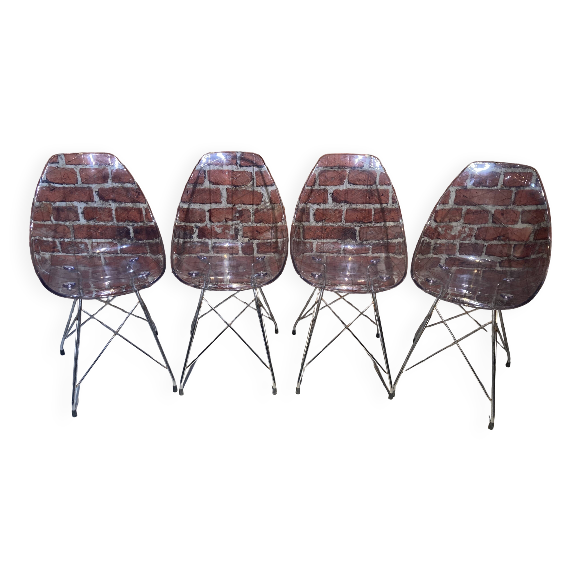 Set of four plexiglass and metal chairs