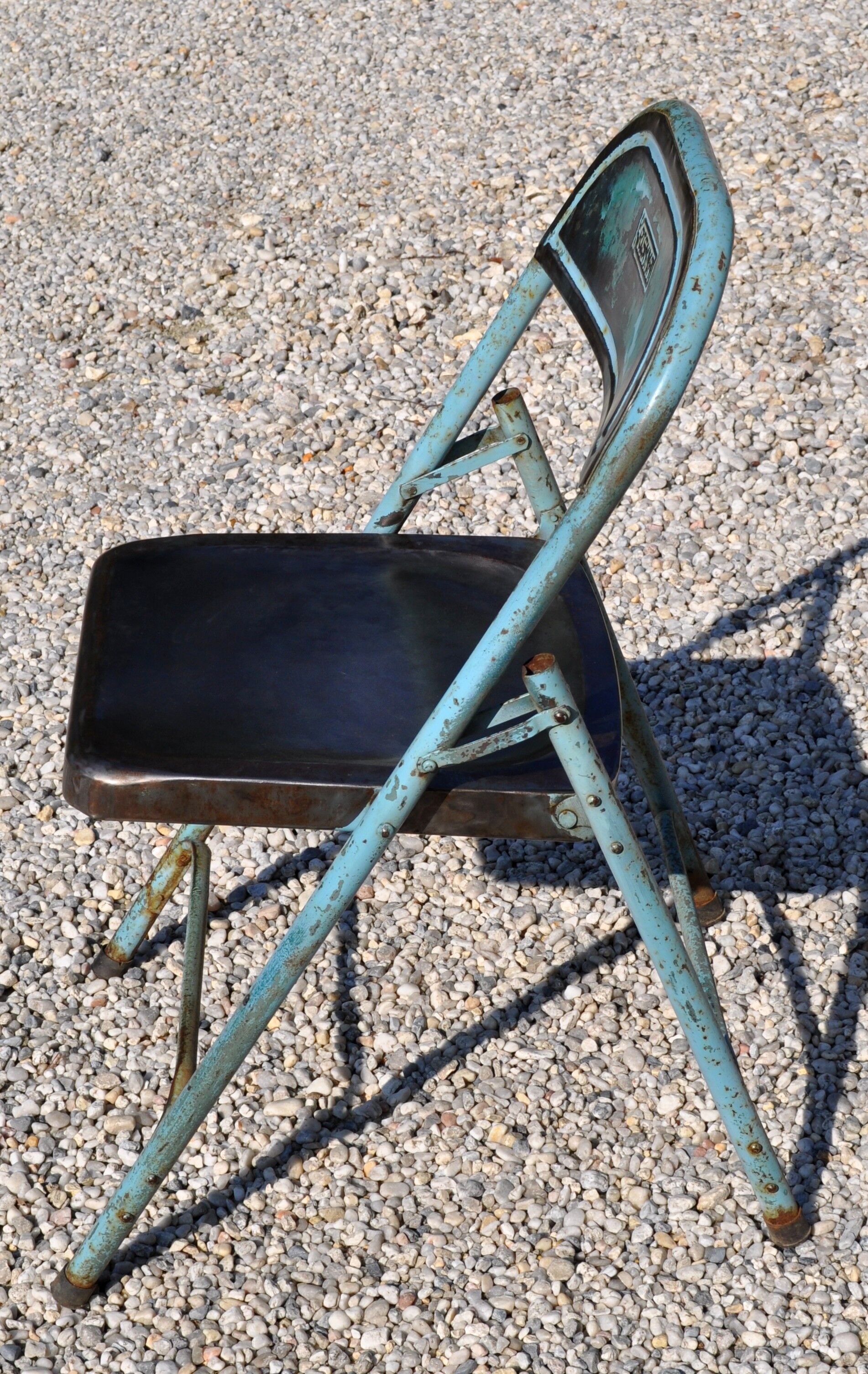Unique folding metal chair
