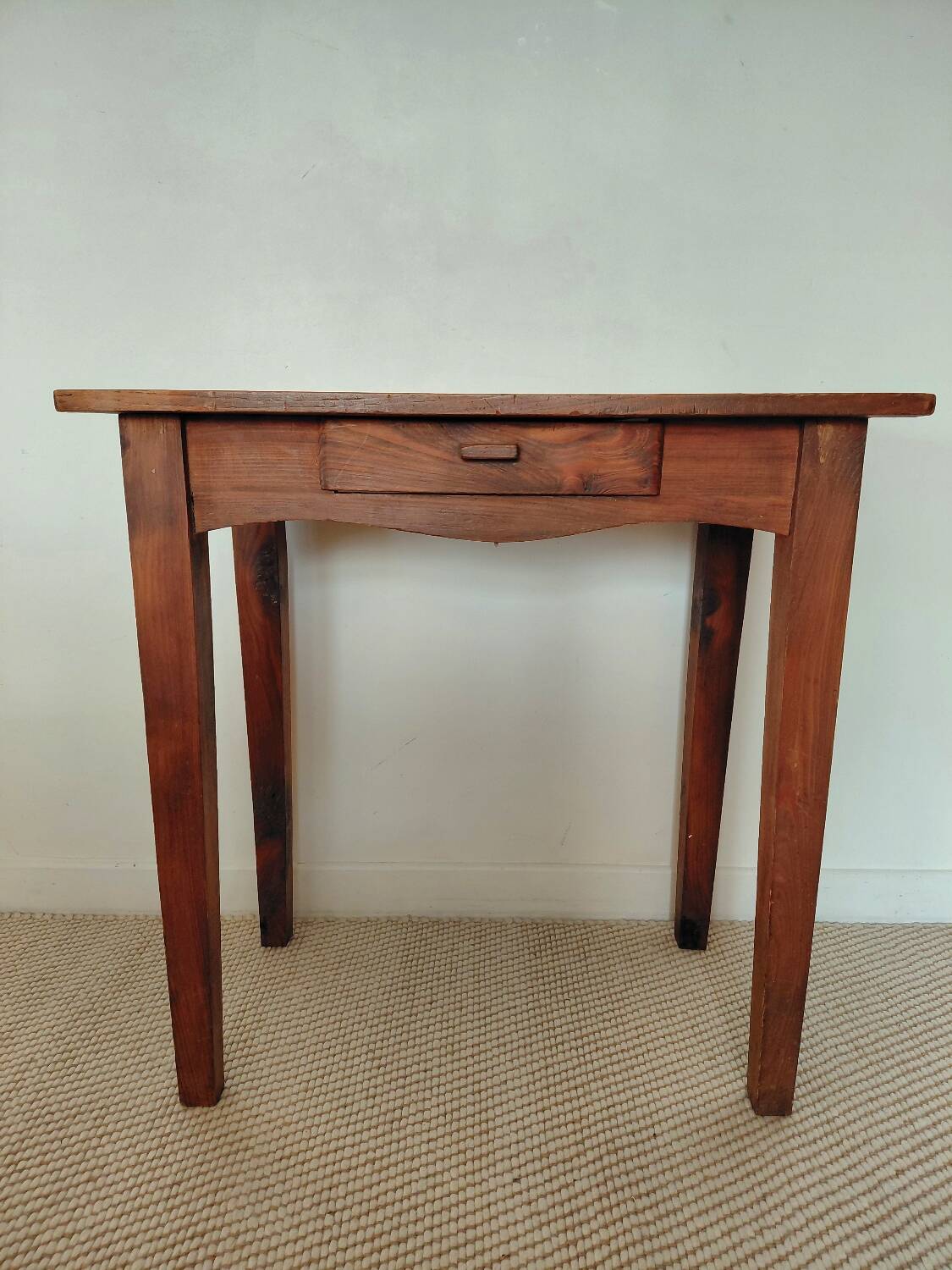 Small antique solid wood table in chic country style with a drawer.
