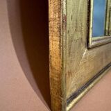 old wood mirror with gold leaf