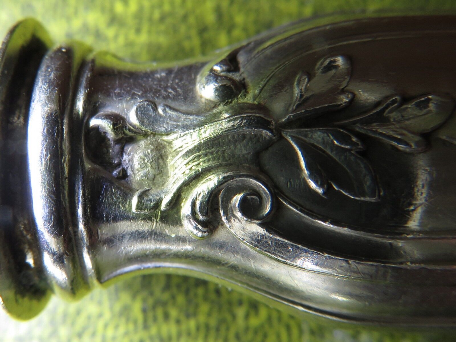 Silver salad servers stuffed in its case