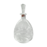 Round carafe in chiseled glass