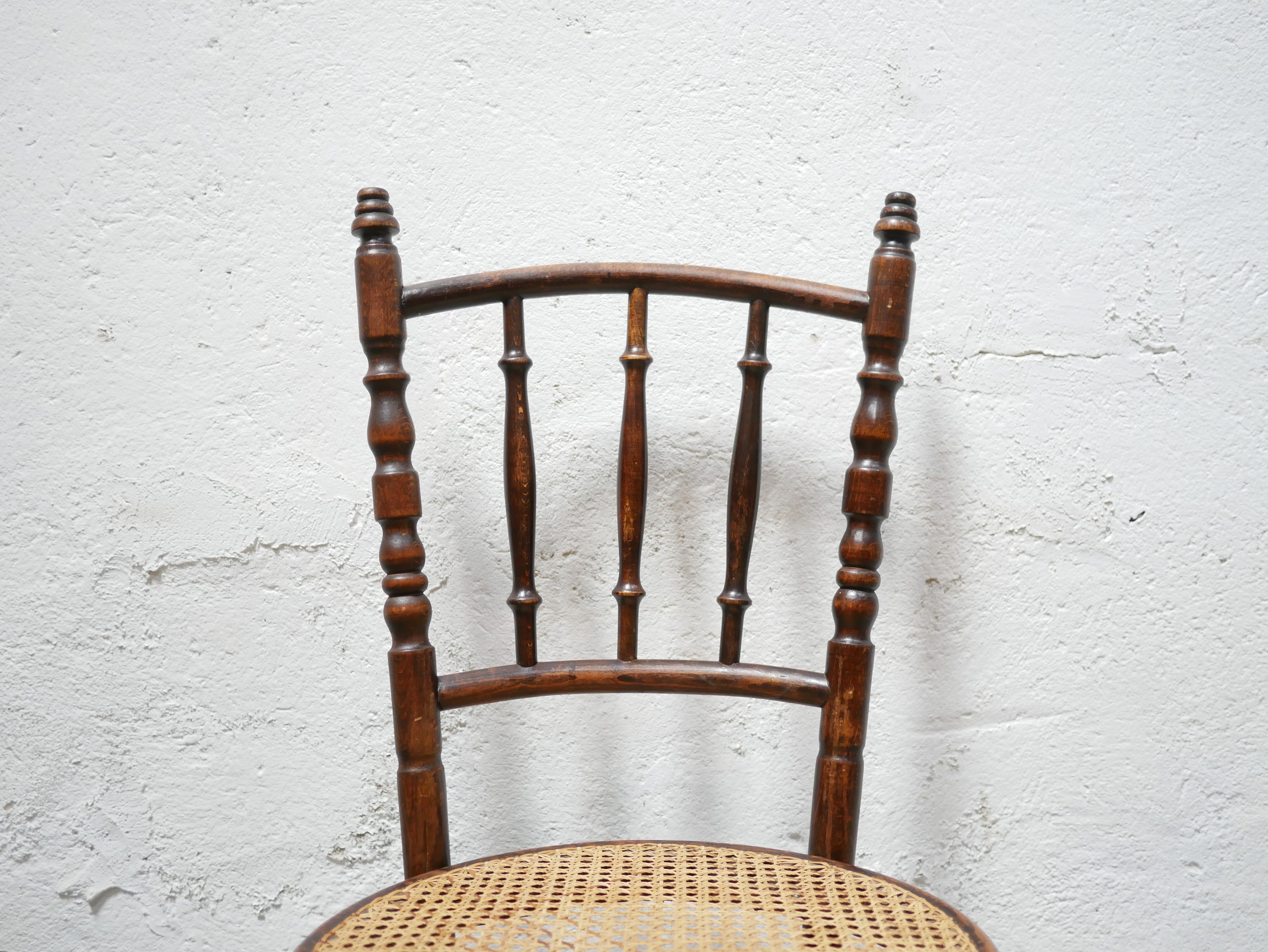 Old wooden cane bistro chair by Fischel editions