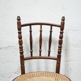 Chaise bistrot cannée ancienne en bois par les éditions Fischel