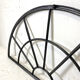 Old arched anthracite grey window