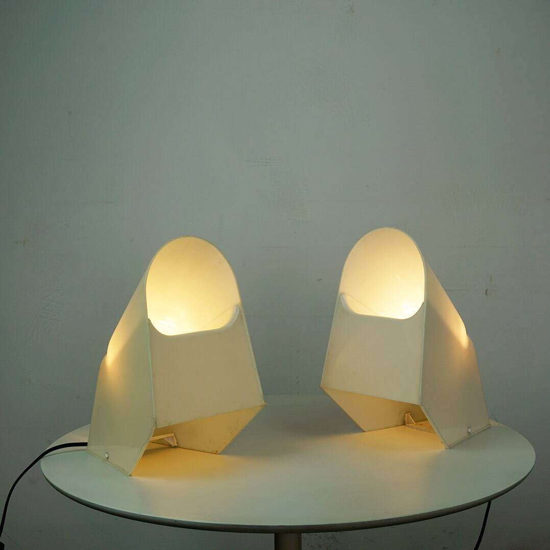 A pair of white plastic table lamps by Cini Boeri for Stilnovo, Italy.