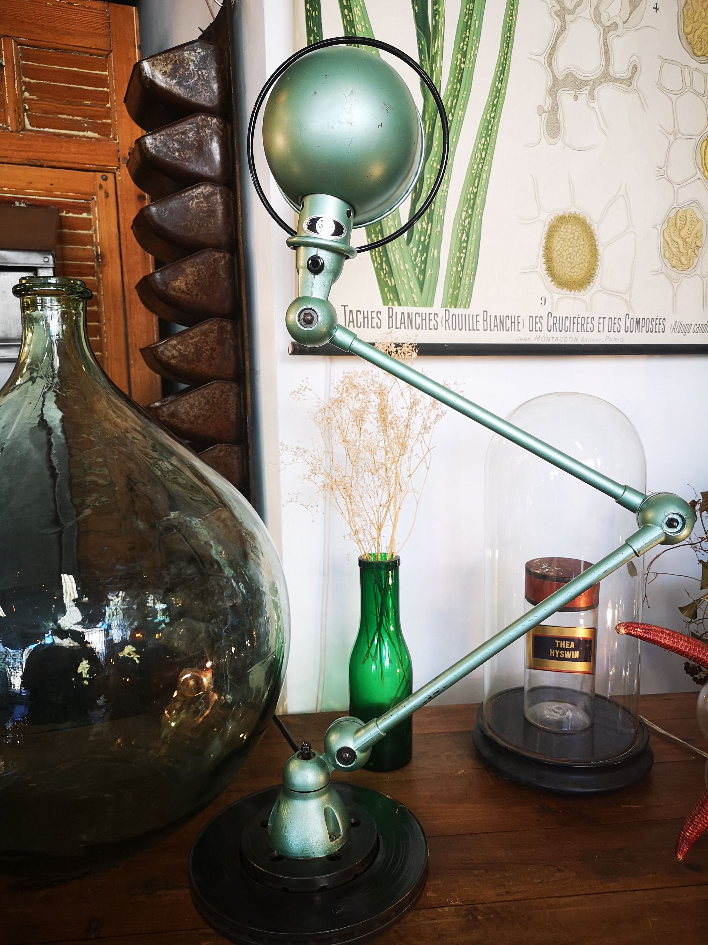 Old green metallic Jieldé lamp