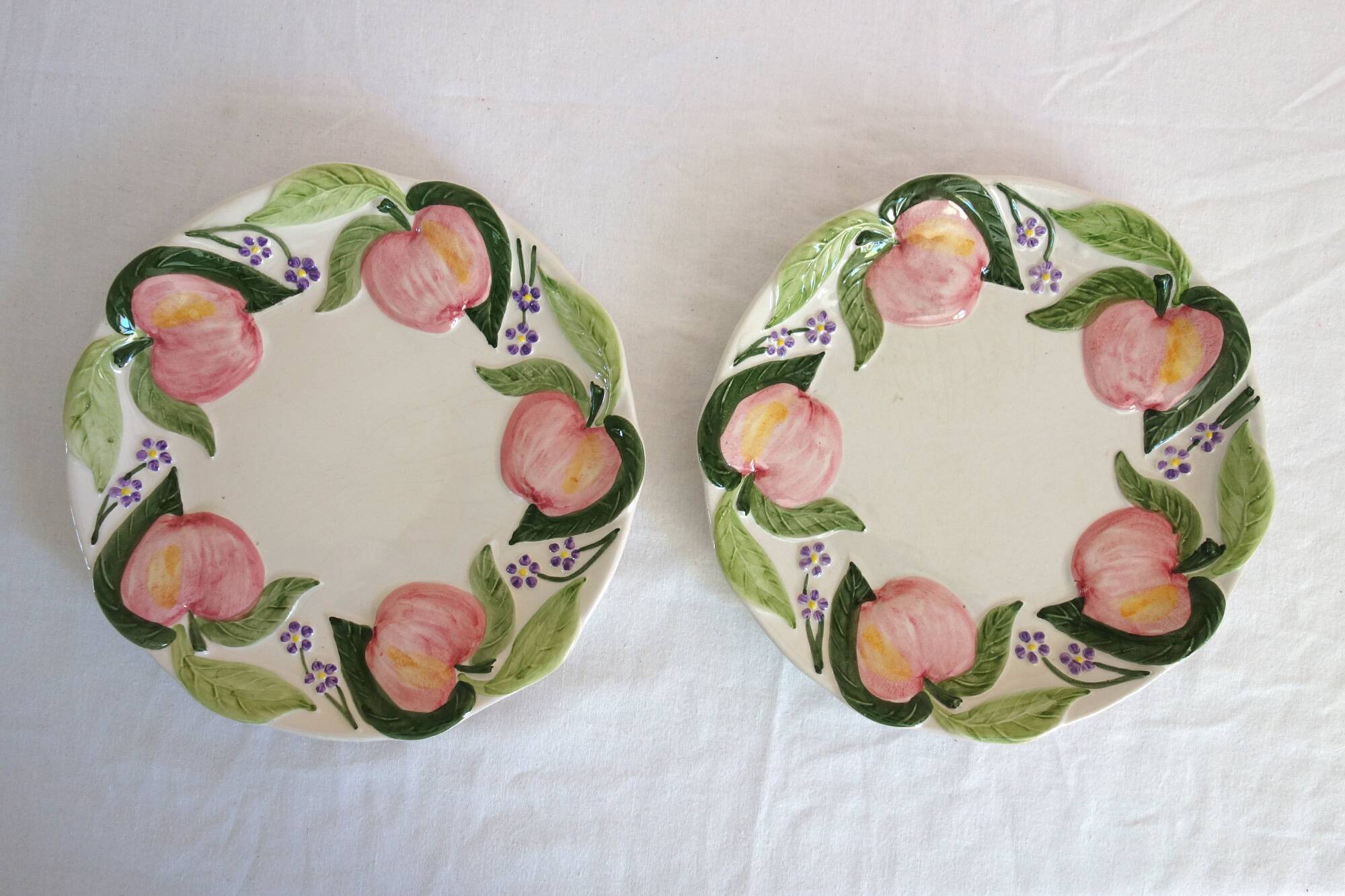 2 vintage apple barbotine plates signed Francesco Guarino