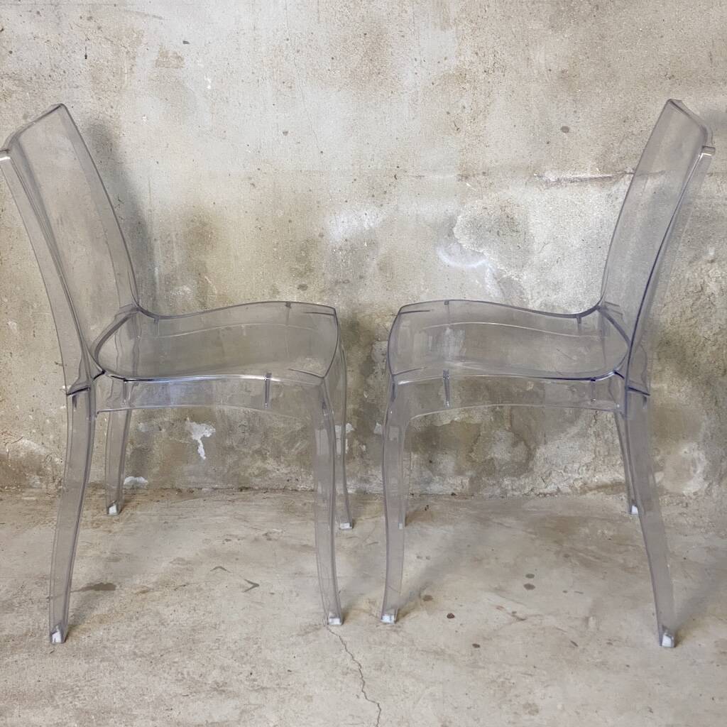 Pair of transparent polycarbonate chairs