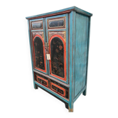 Restored antique Vietnamese wardrobe with care.
