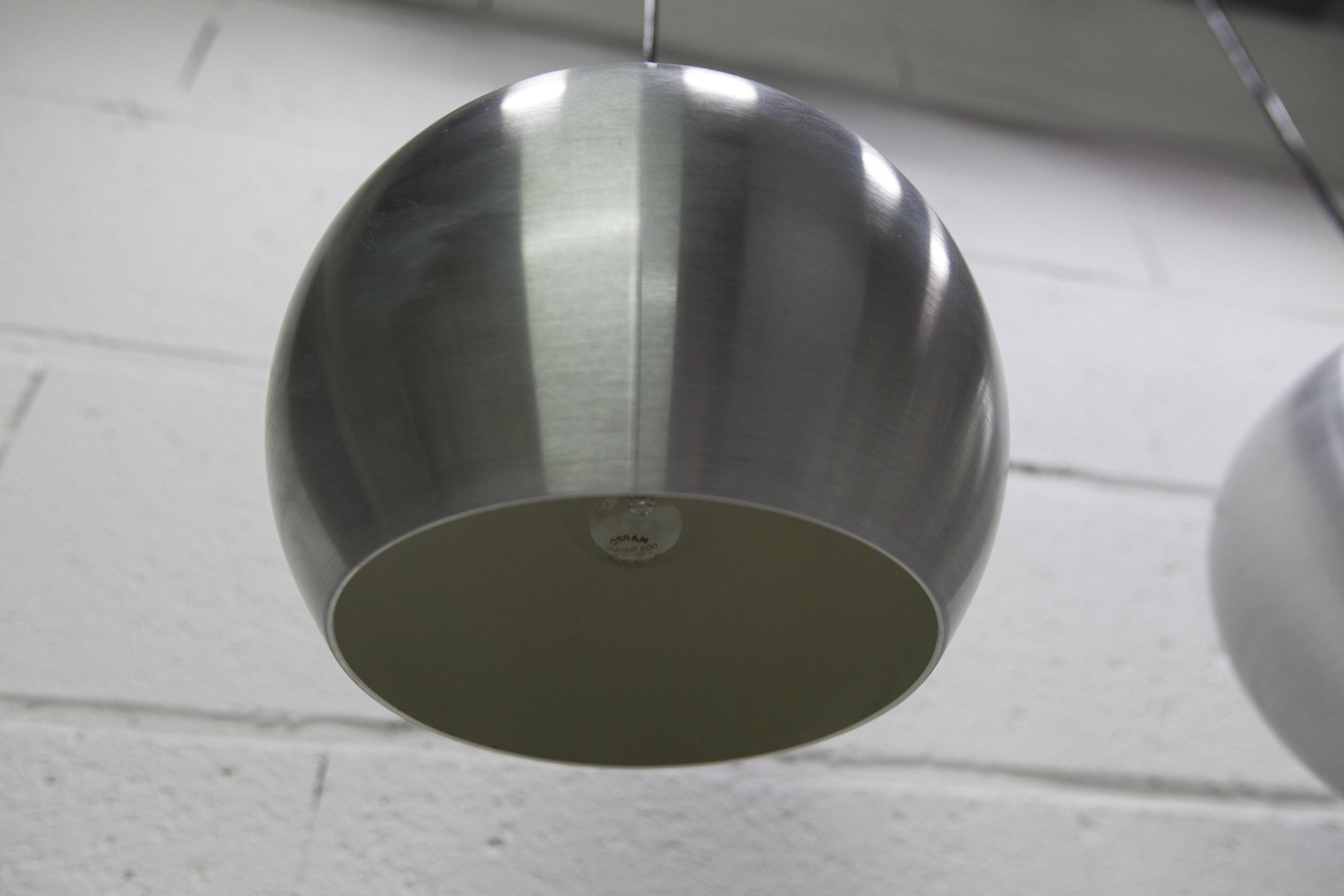 Pair of functional 70's aluminum ball pendants
