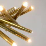 Pair of matte gold-plated brass chandeliers. Italian work from the 1970s.