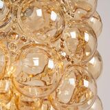 Large amber bubble glass pendant light by Helena Tynell for Limburg, Germany, 1970s.