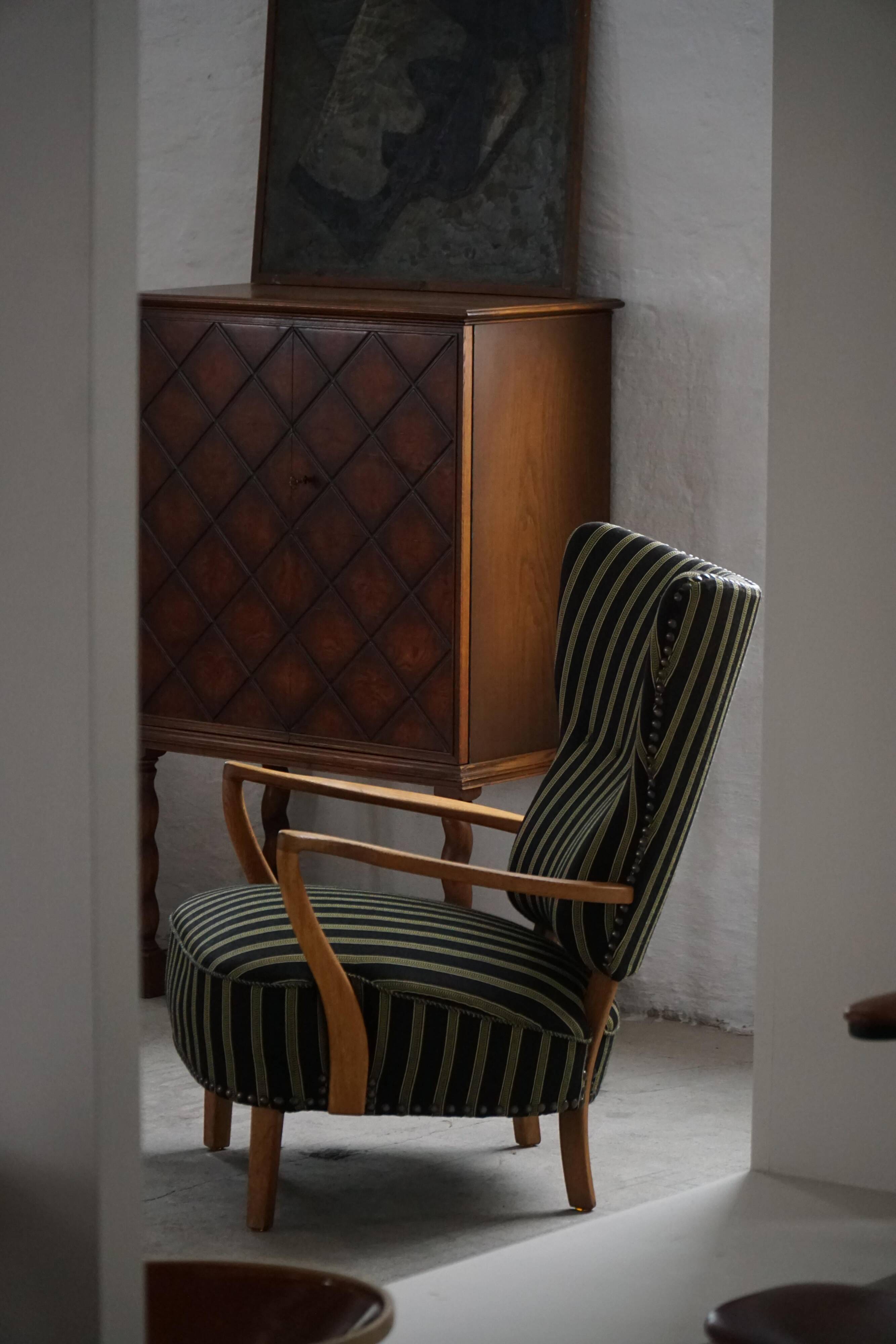 Danish mid-century chaise longue with a convertible backrest in oak, Viggo Boesen, 1950s.