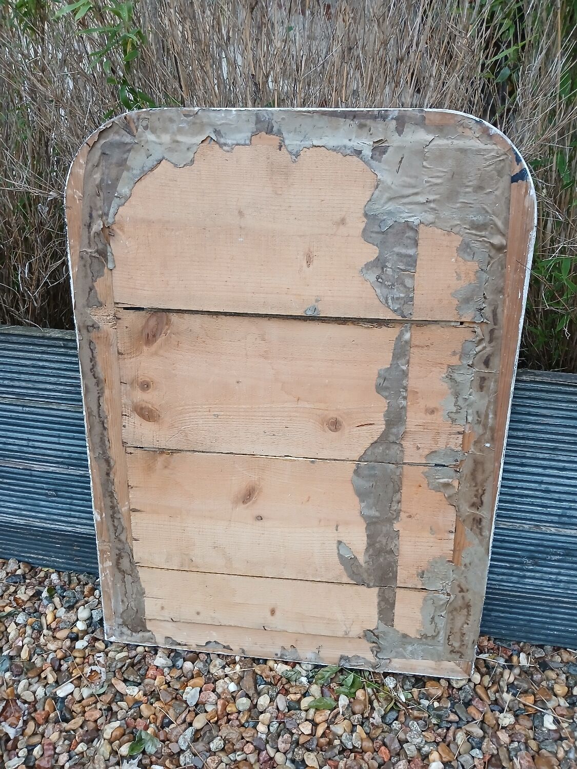 Antique mirror with carved wooden frame