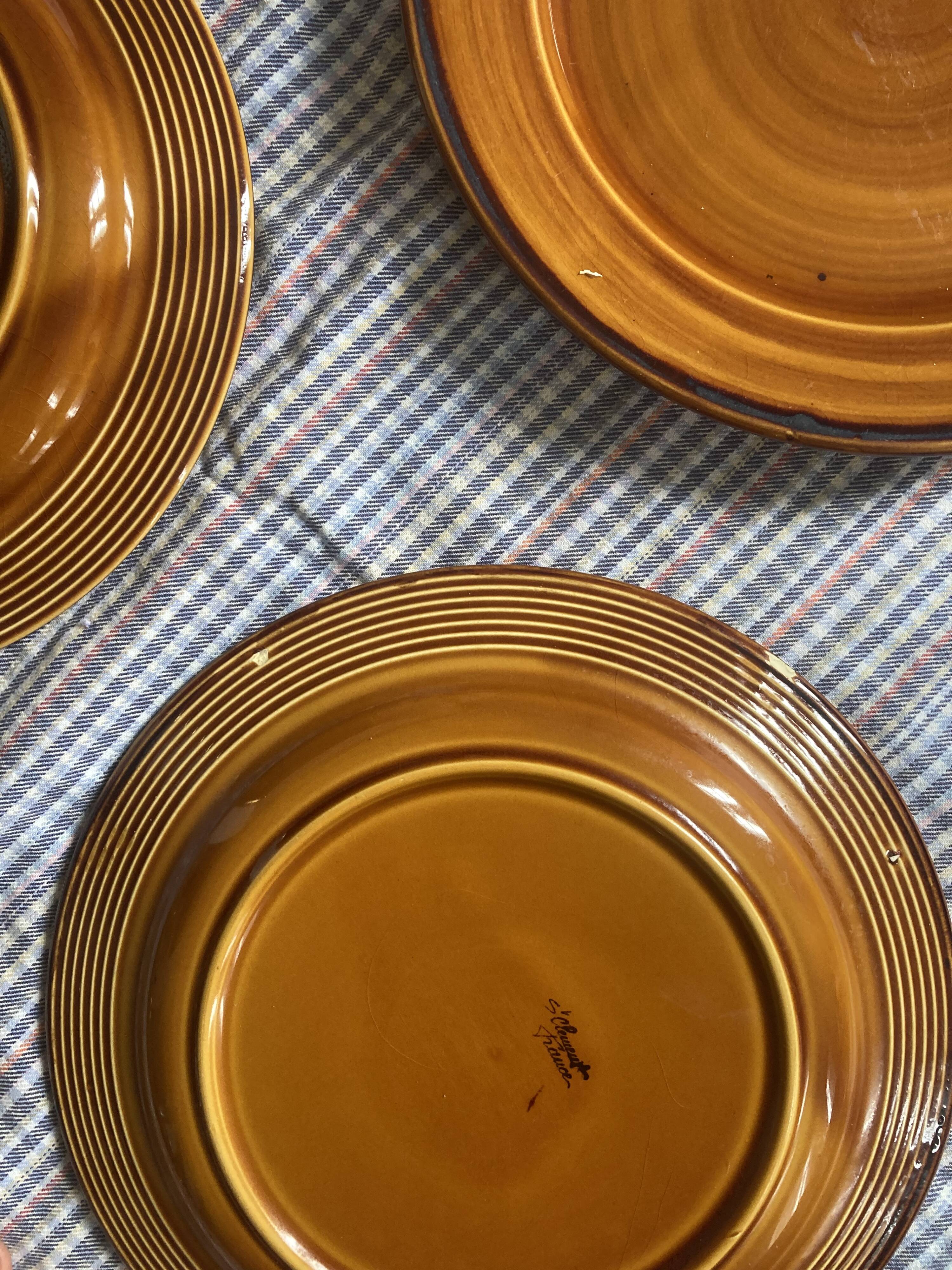 7 flat plates in earthenware Saint Clément vintage brown