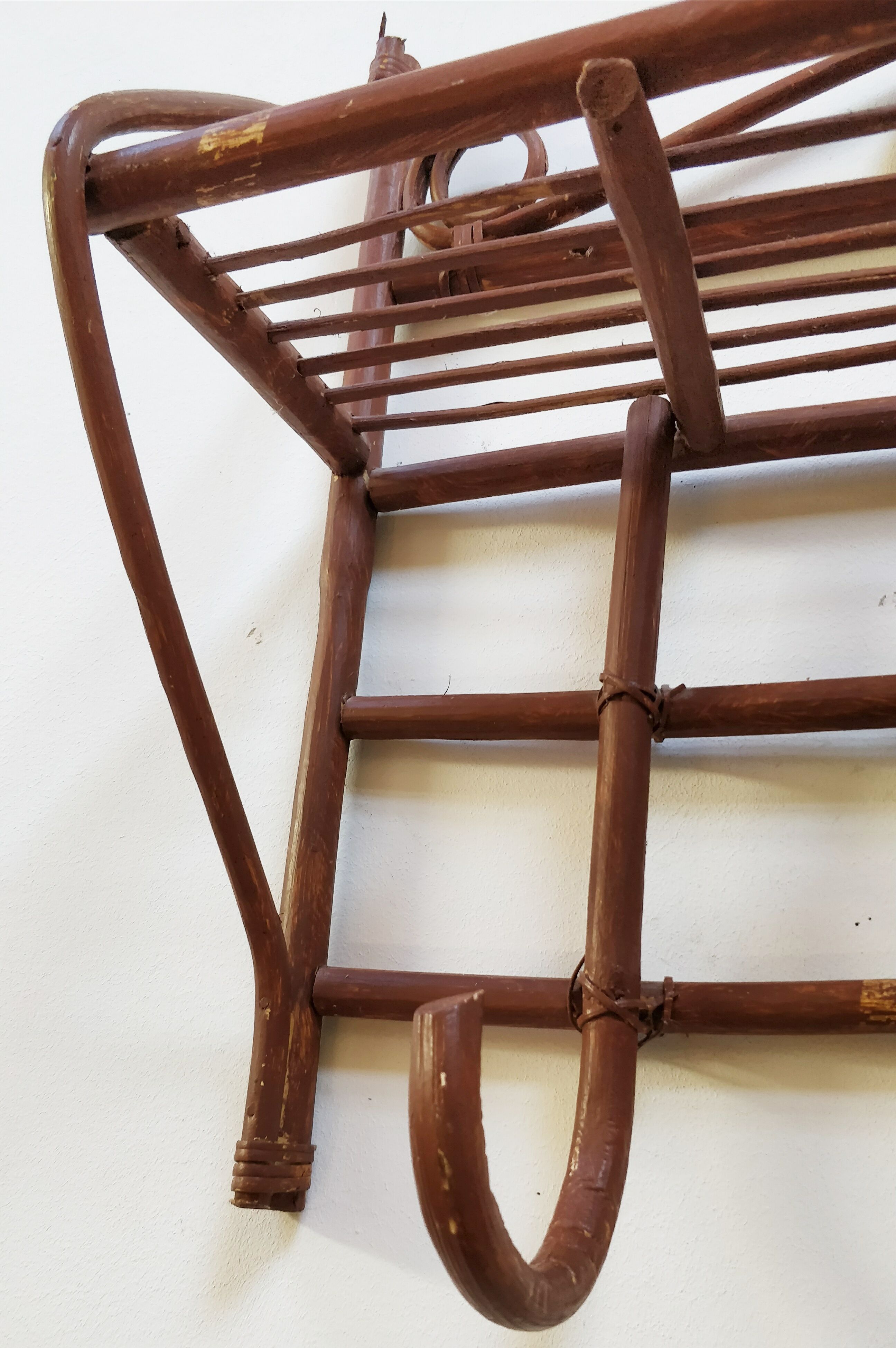 Rattan wall coat rack