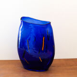 Blue blown glass vase and orange inclusion