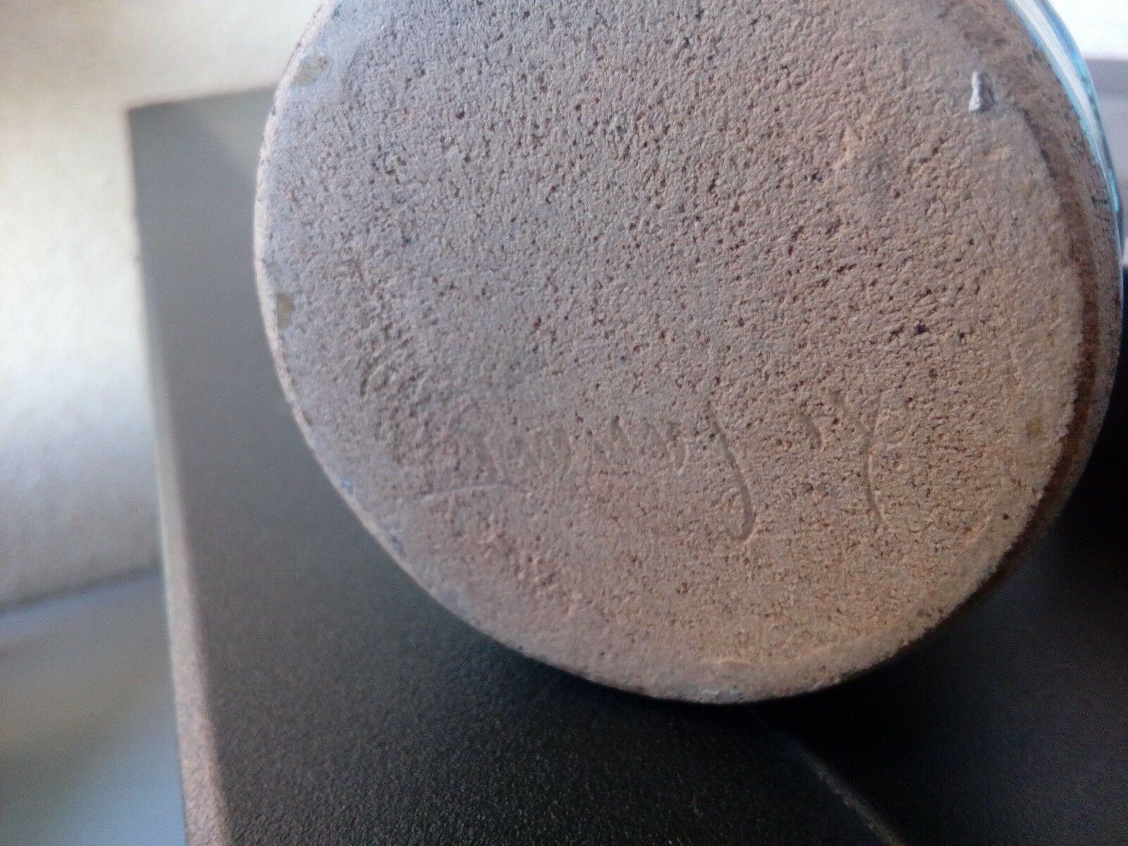 Enamelled sandstone bottle