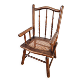 Vintage wooden and caned children's armchair, Baumann style from the 1950s.
