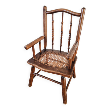 Vintage wooden and caned children's armchair, Baumann style from the 1950s.