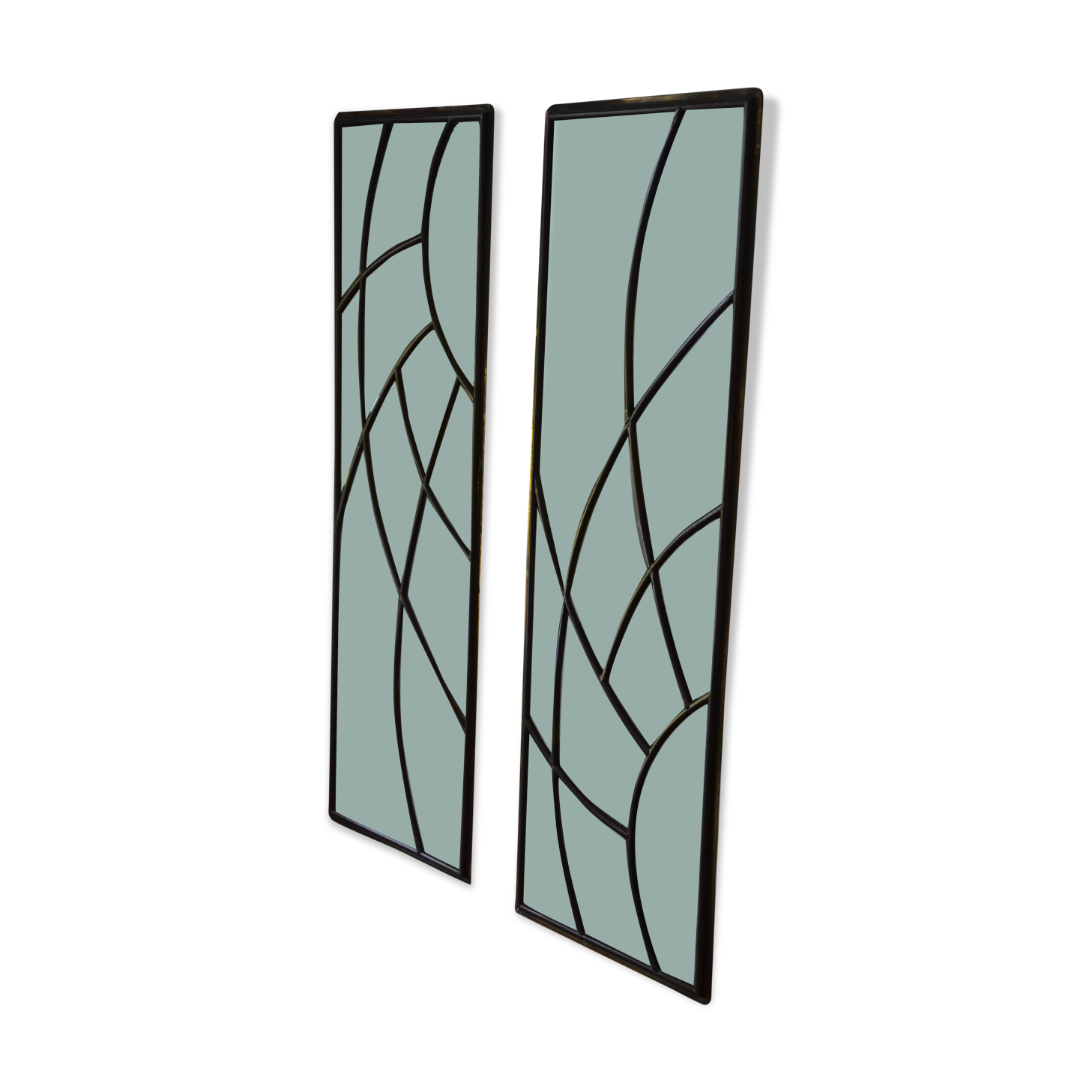 Deux vitraux en verre biseauté et laiton