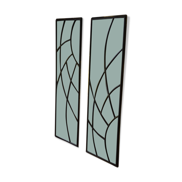 Deux vitraux en verre biseauté et laiton