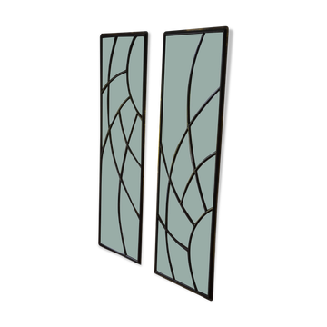 Two bevelled glass and brass stained glass windows.