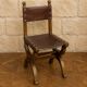 Suite de six chaises de style Renaissance en chêne et cuir