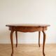 Round extendable oak dining table
