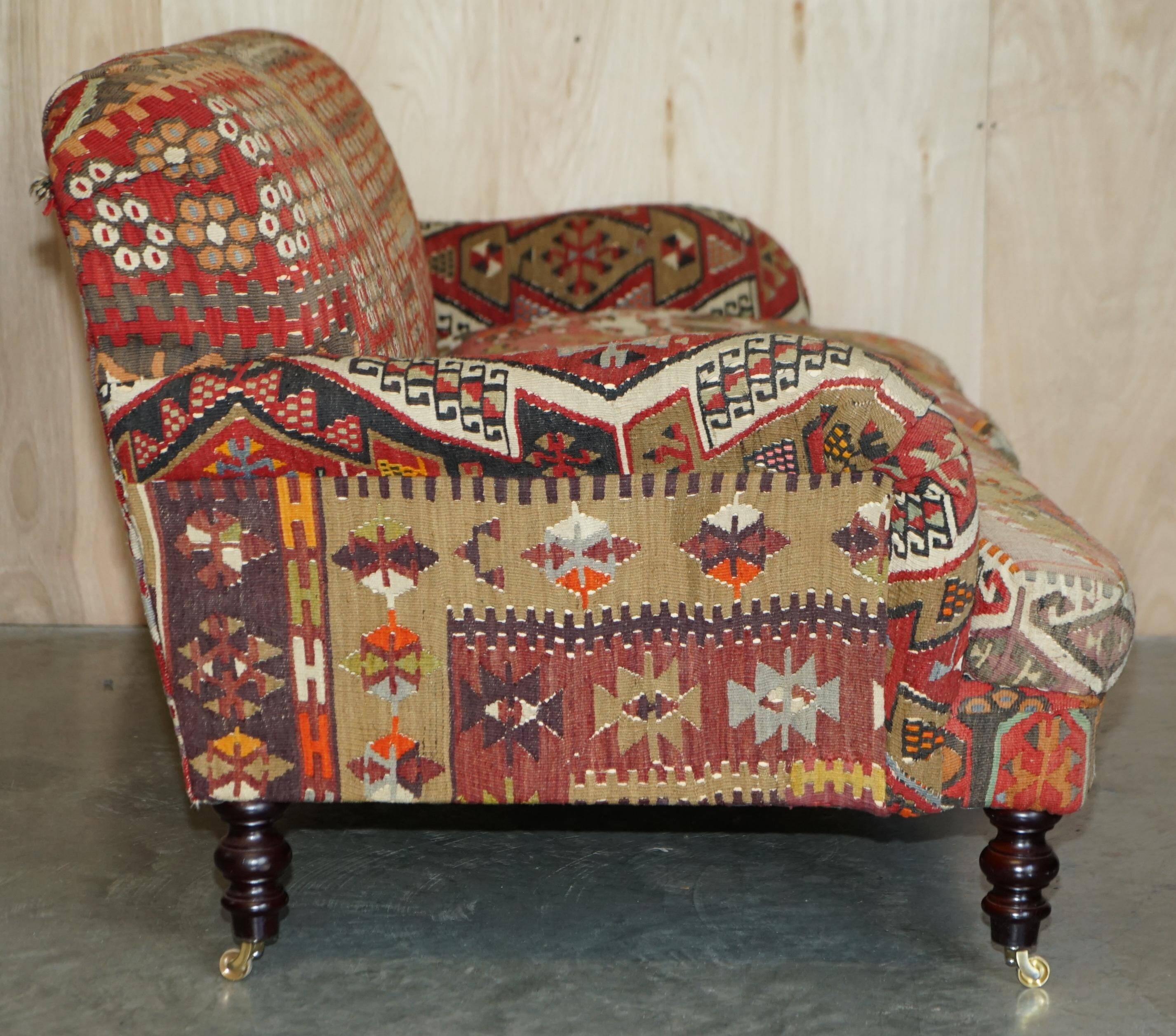 Vintage three-seater canapé by George Smith upholstered in Kilim with feather cushions.