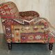 Vintage three-seater canapé by George Smith upholstered in Kilim with feather cushions.