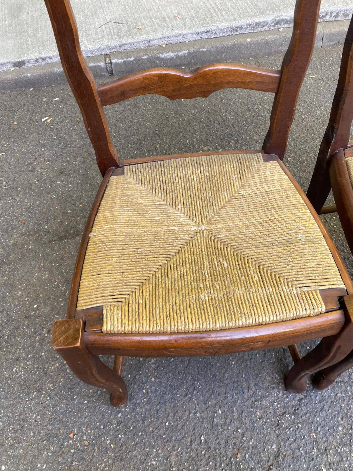 2 dining chairs with carved solid wood and rush seats in Louis XV shell style.