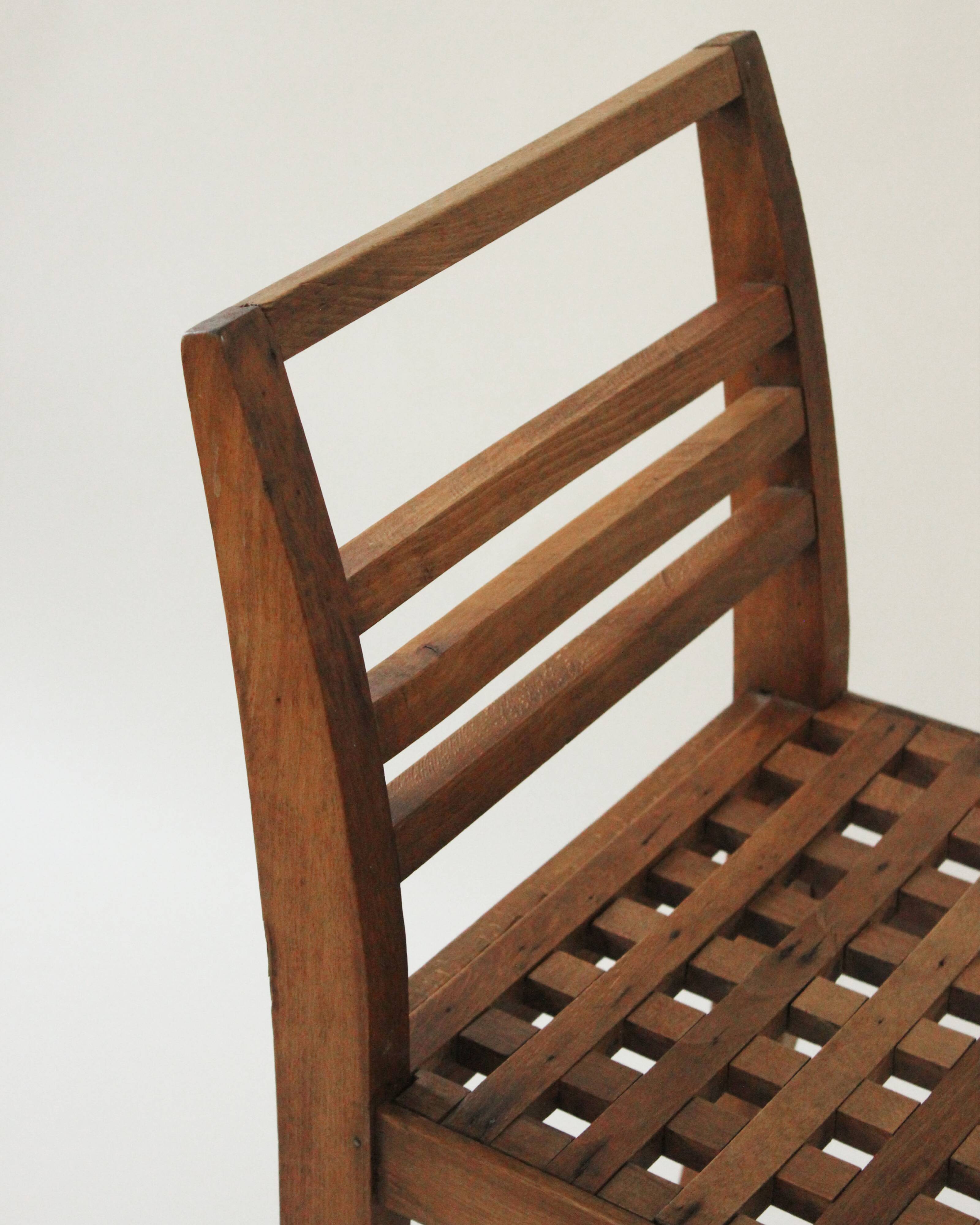 3 chairs model 103 with lattice seats by René Gabriel